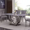 Buy Carrera Marble Dining Table with Stainless Steel Base from Furnituretta